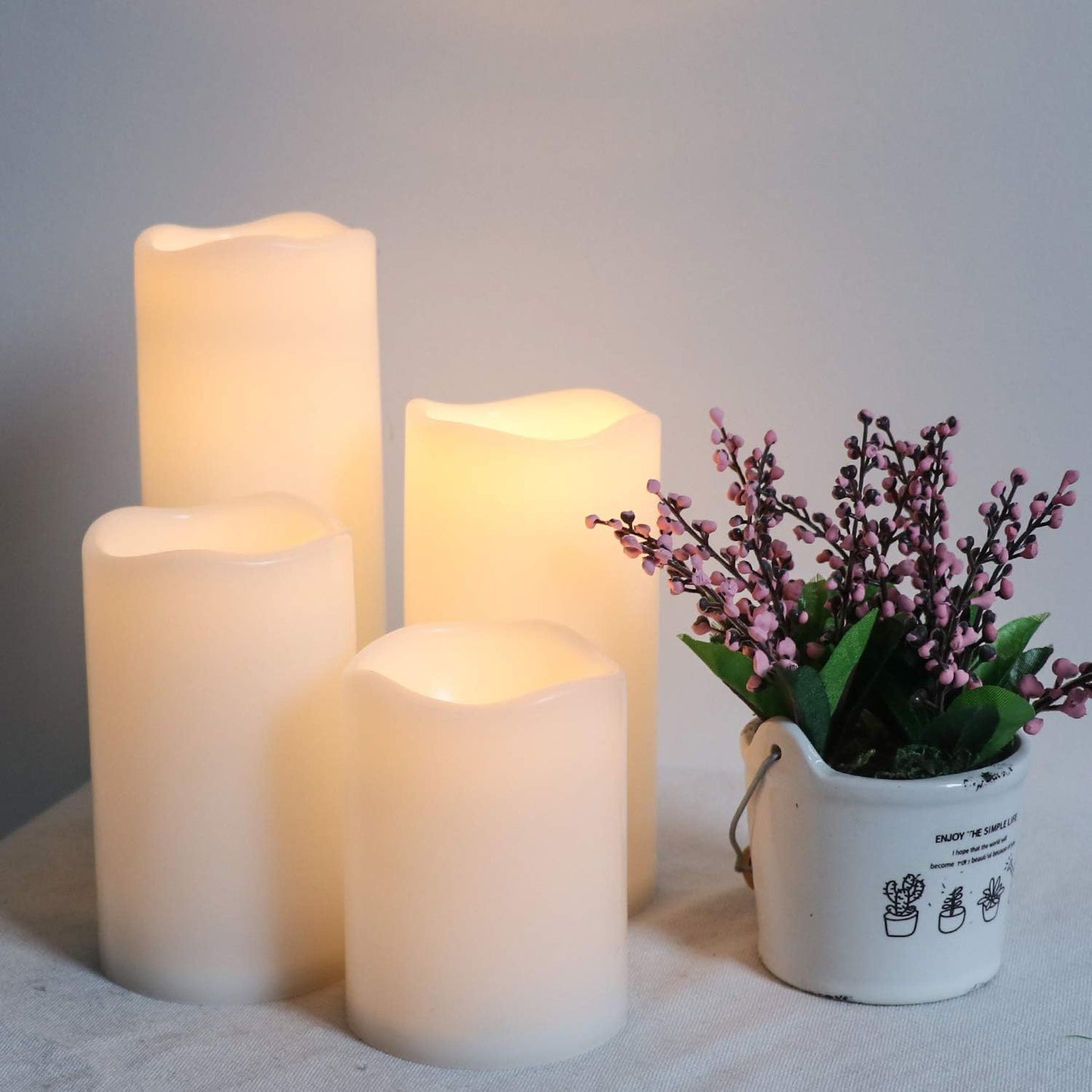 Outdoor Flameless Flickering Candles with 6 Hour Timer, 3 AAA Batteries Operated Waterproof LED White Plastic Pillar Candles Set of 4 Home Garden Decoration(3" x 4",5",6",8")