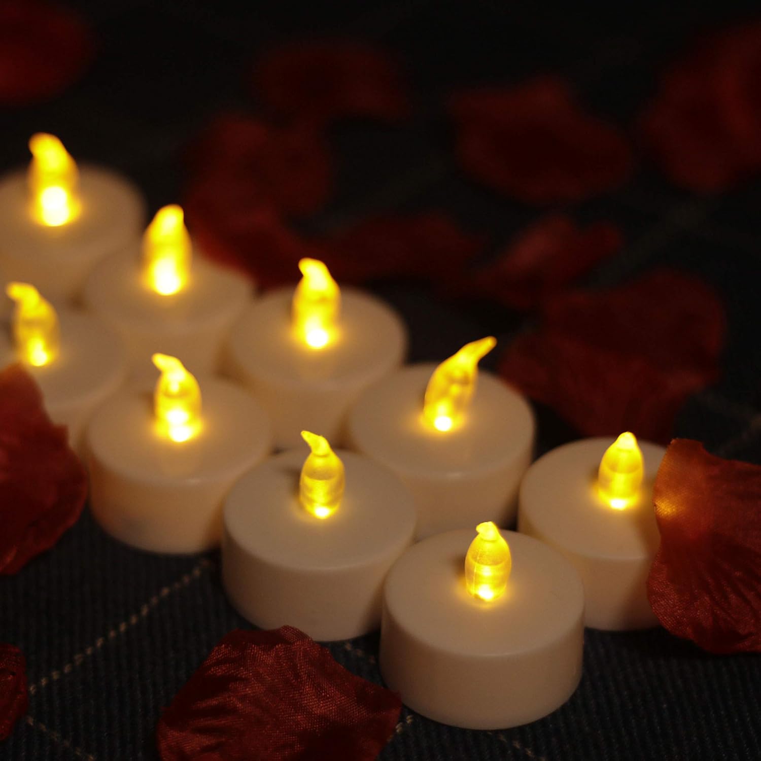 YIWER Tea Lights LED Tea Light Candles 200 Hours Pack of 100 Realistic Flickering Bulb Battery Operated Tea Lights for Seasonal Festival Celebration Electric Fake Candle in Warm Yellow(2 * 50)