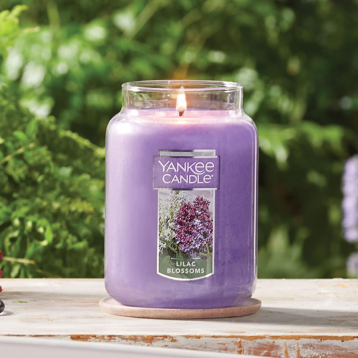 Yankee Candle Lilac Blossoms Scented Classic 22oz Large Jar Single Wick Candle Over 110 Hours of Burn Time Perfect for Gifting Gatherings and Seasonal Decorations
