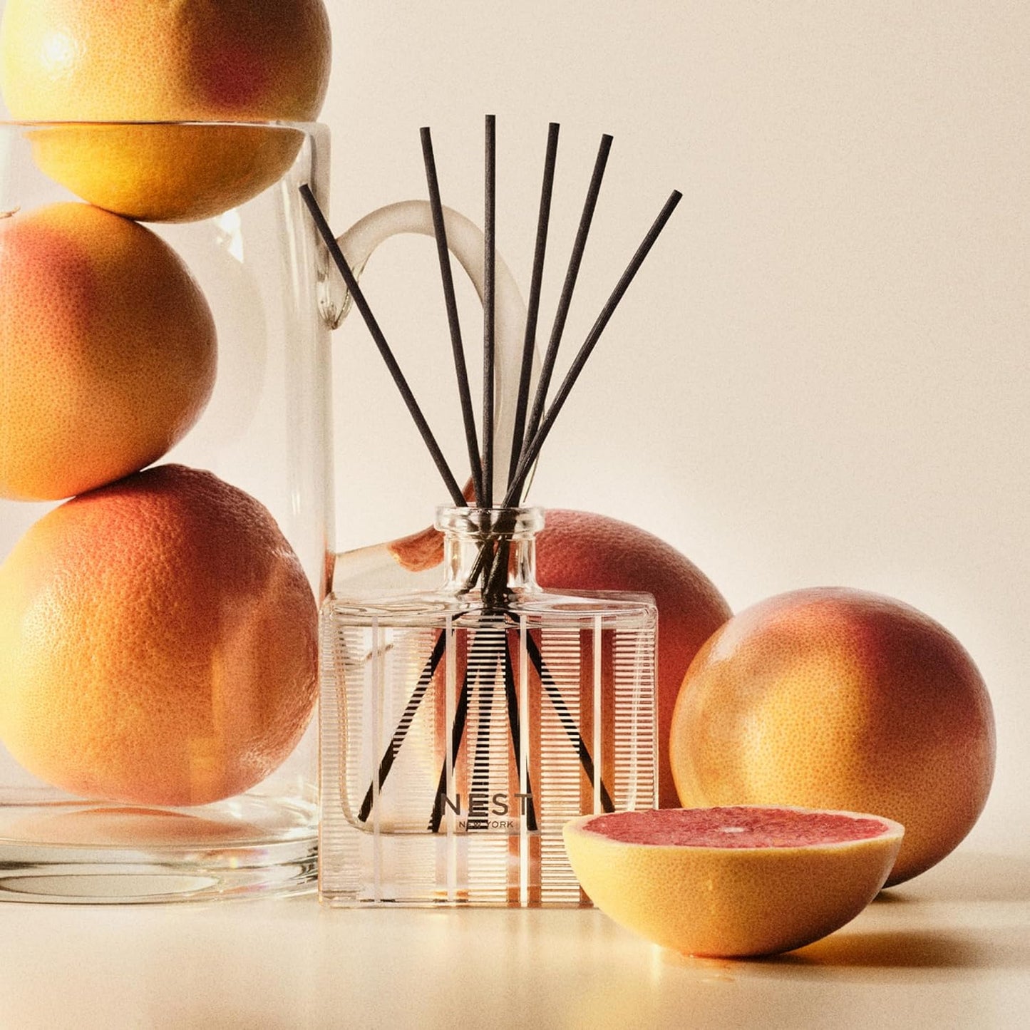NEST New York Reed Diffuser, Grapefruit - 5.9 fl oz - Fragrance for Up to 90 Days - Reusable, Refillable Glass Holder - Includes 8 All-Natural Reed Sticks - Flame Free