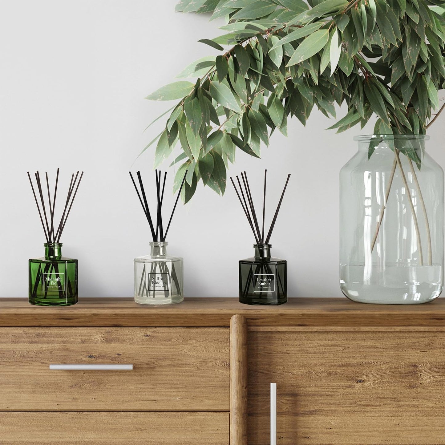 Bellevue Reed Diffuser Set, Three 6 fl oz Glass Filled Diffuser, Highly Concentrated Fragrances with Essential Oils, Home Fragrance (Leather Ember, Midnight Fig, Saffron Blooms)